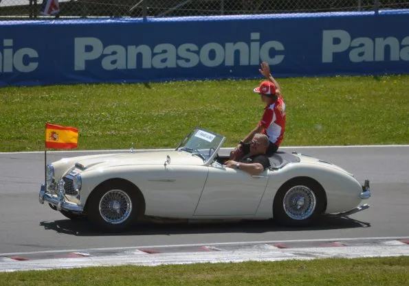 Fernando Alonso waving to fans at 2012 Canadian GP driver parade