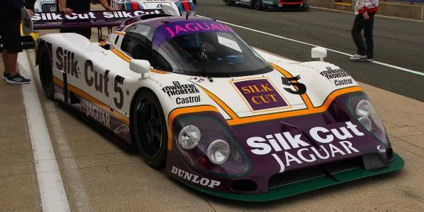Jaguar XJR-8 Group C sports prototype in Silk Cut purple and white, side view