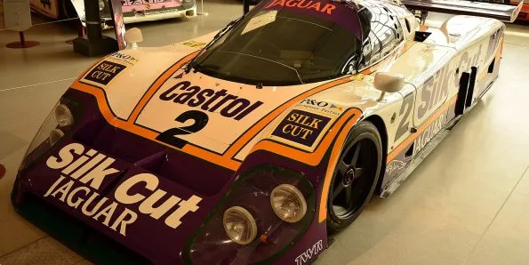 Silk Cut TWR Jaguar XJR-9 in purple and white on display at the Coventry Motor Museum