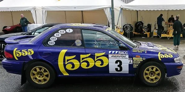 Piero Liatti's 1996 World Rally Championship Subaru Impreza 555 in blue and yellow 555 livery
