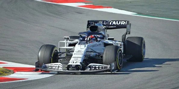Pierre Gasly driving the AlphaTauri AT01 in white and navy