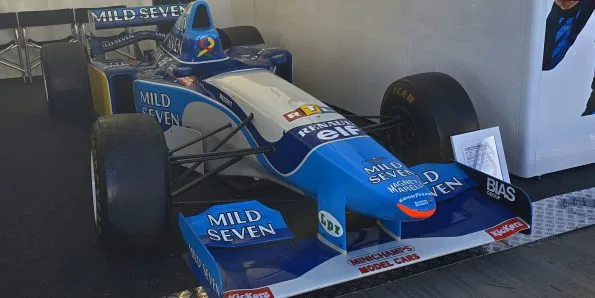 Benetton B195 in blue and yellow Mild Seven livery on display