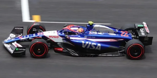 Yuki Tsunoda driving the VCARB 01 in blue and white at the 2024 Chinese Grand Prix