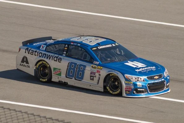 Dale Earnhardt Jr.'s blue number 88 Nationwide Chevrolet of Hendrick Motorsports, on track.