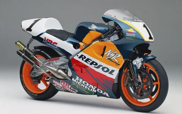 Honda HRC NSR500 motorcycle ridden by Mick Doohan in iconic Repsol livery during the 1997 premier-class season