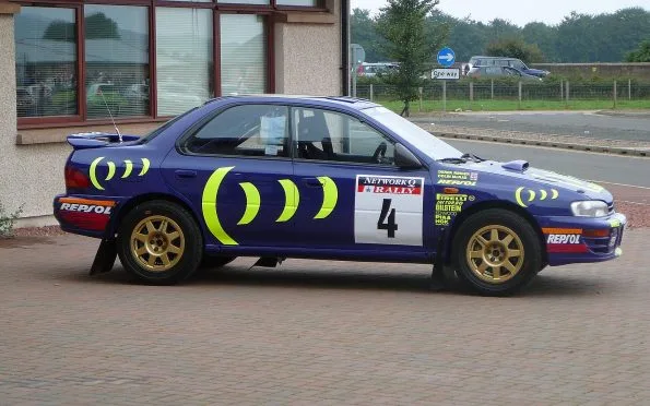 Subaru World Rally Team Colin McRae driving the iconic blue and gold Impreza 555 during his 1995 World Rally Championship winning season