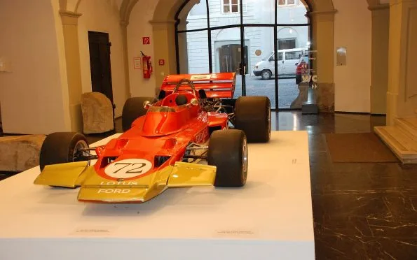 Team Lotus Type 72 Formula One racing car showcasing the iconic Red, White and Gold livery and ground effect aerodynamic design