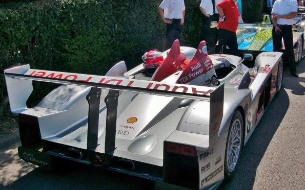 Audi Sport Team Joest 2006 Audi R10 TDI diesel Le Mans prototype racing car participating in a dynamic demonstration run.