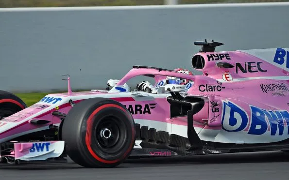 Aston Martin predecessor team pink Formula 1 race car driven by Sergio Perez during testing at the Circuit de Barcelona-Catalunya.