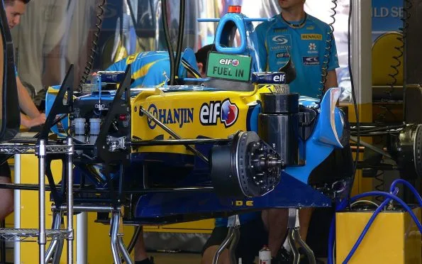Benetton Renault F1 R26 blue and yellow racing car prepared in the team garage during the 2006 season