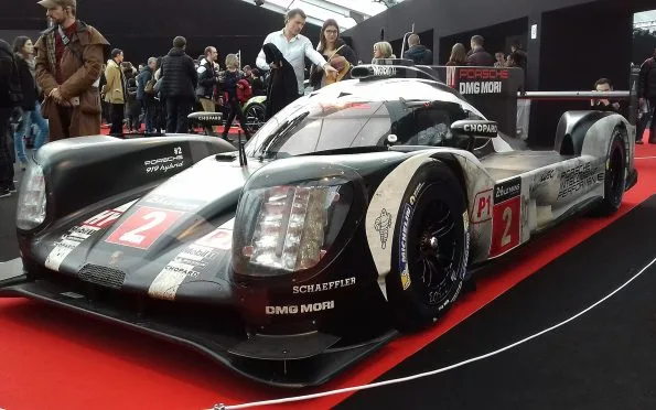 Porsche 919 Hybrid Le Mans prototype race car in white, red and black during the WEC championship