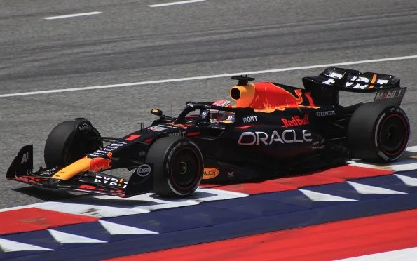 Oracle Red Bull Racing hybrid F1 car driven by Max Verstappen on track