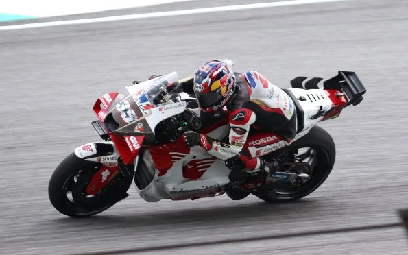 LCR Honda Somkiat Chantra and Johann Zarco competing with the team's official Honda racing machinery in modern Grand Prix action.