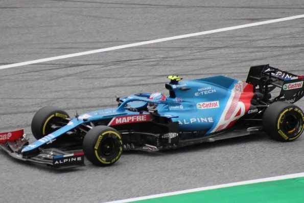 Esteban Ocon in the blue Alpine, number 31, on track in Austria.