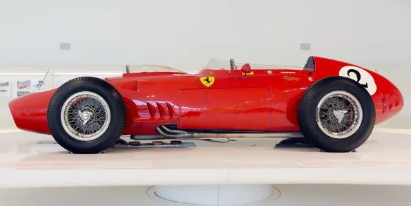 A Ferrari 246 F1 "Dino" shown in side profile at the Enzo Ferrari Museum