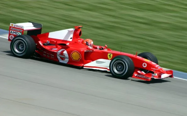 Scuderia Ferrari F2004 Formula 1 car driven at high speed by Michael Schumacher during the 2004 United States Grand Prix at Indianapolis