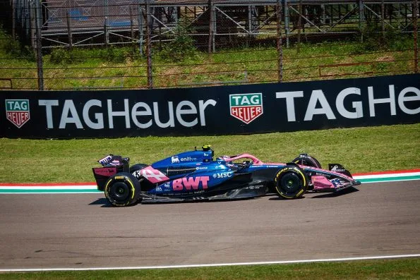 Franco Colapinto in the blue and pink Alpine, number 43, on track at Imola.