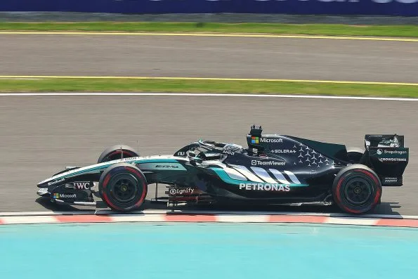 George Russell exiting the final chicane in the Mercedes W17 at Suzuka during the 2026 Japanese Grand Prix