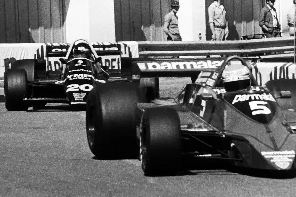 James Hunt in his Wolf WR7 trailing behind Niki Lauda's Brabham BT48 as they enter Rascasse during the 1979 Monaco Grand Prix practice.