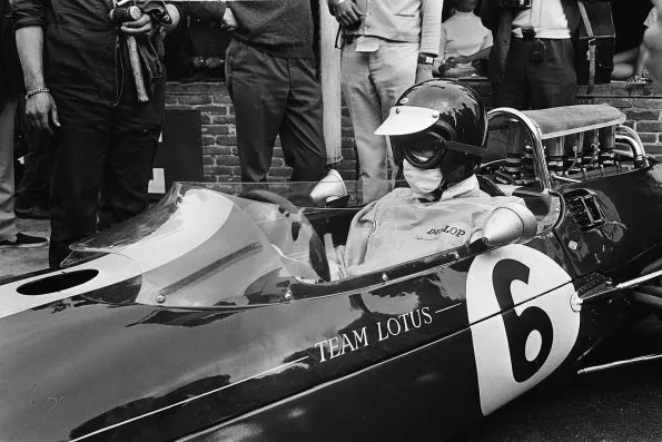 Jim Clark sitting in the cockpit of his Team Lotus car before the start at Zandvoort in 1965