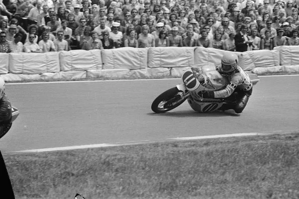 Kenny Roberts leaned into a corner on a 250cc Yamaha carrying the number 11 at Assen.