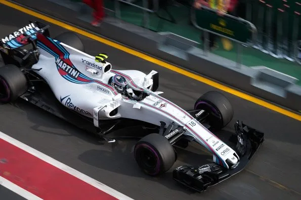 Lance Stroll driving the white and blue Williams during his rookie Formula One season.