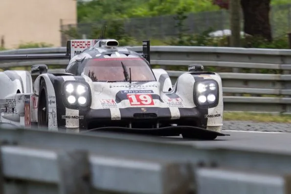 Nico Hülkenberg, Earl Bamber, and Nick Tandy's winning No. 19 Porsche 919 Hybrid at the 2015 24 Hours of Le Mans.