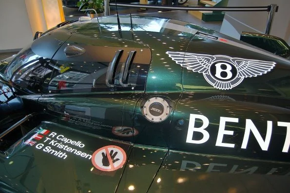 Tom Kristensen's victorious 2003 Le Mans race car, the No. 7 Bentley Speed 8 co-driven by Capello and Smith, on display.