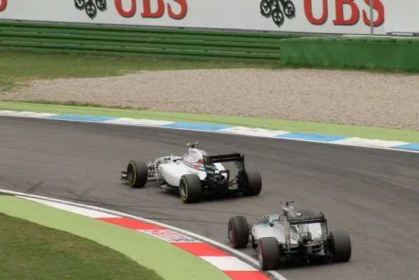 Valtteri Bottas in the Williams ahead of Lewis Hamilton in the Mercedes at Hockenheim.