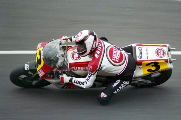 Wayne Rainey leaned hard into a corner on the white and red Lucky Strike Roberts Yamaha, number 3, his name across the shoulders of his leathers.