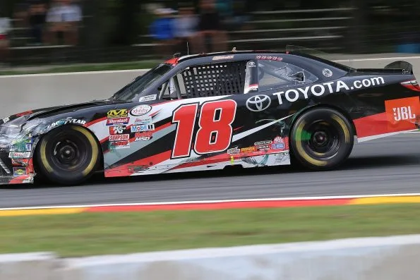 Christopher Bell's black No. 18 Toyota.com Joe Gibbs Racing car on track during the 2017 Johnsonville 180 at Road America.
