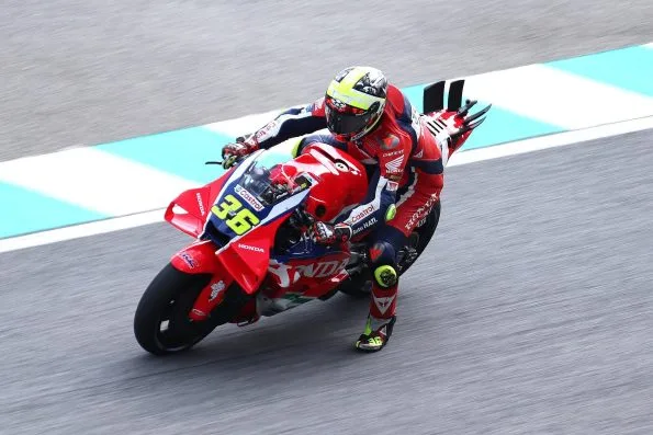 Joan Mir, number 36, riding his Honda HRC Castrol machine at the 2025 Malaysian motorcycle Grand Prix.