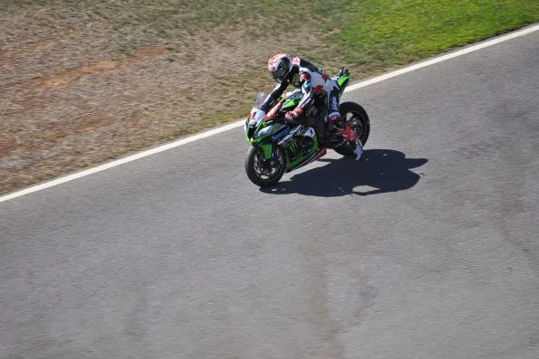 Rea leaning his green Kawasaki Ninja ZX-10RR through a corner during Race 1 at Portimão in September 2017