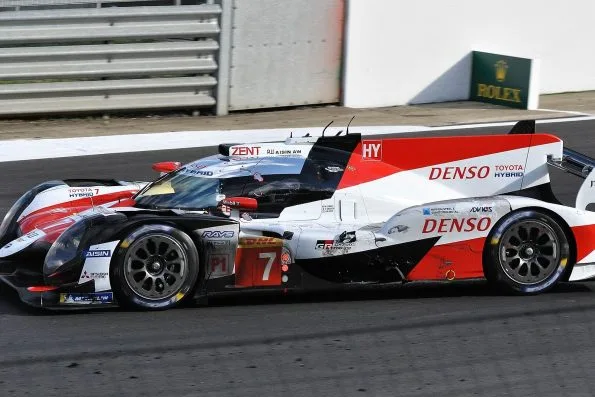 Kamui Kobayashi turning the white and red Toyota TS050 Hybrid, car 7, into Abbey corner during the 2018 6 Hours of Silverstone.