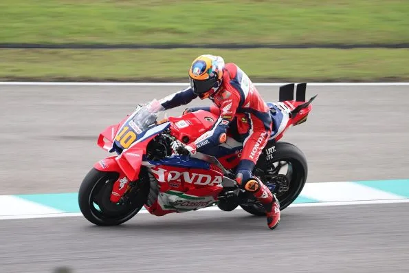 Luca Marini, number 10, riding his Honda HRC Castrol machine at the 2025 Malaysian motorcycle Grand Prix.