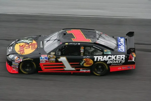 Martin Truex Jr.'s black No. 1 Bass Pro Shops Chevrolet Impala on track at Daytona during Speedweeks in 2008.