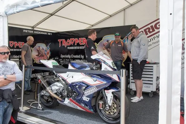 Peter Hickman’s Briggs Equipment and RAF Reserves BMW S1000RR in the paddock awning at the 2015 Isle of Man TT races.
