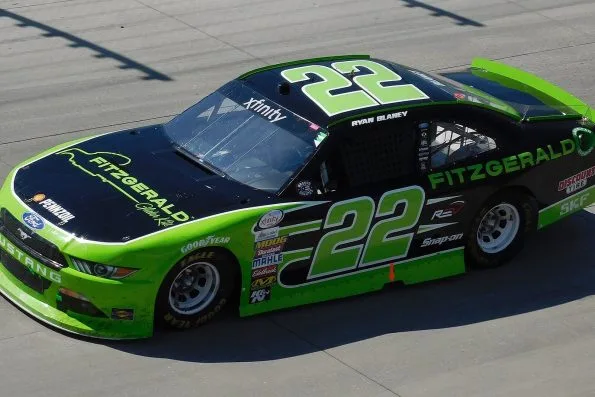 Ryan Blaney's green No. 22 Fitzgerald Glider Kits Ford at Dover International Speedway in 2017.