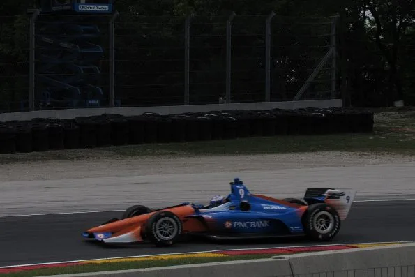 Scott Dixon in the blue and orange PNC Bank Chip Ganassi Dallara-Honda, car 9, running practice laps for the 2018 Kohler Grand Prix at Road America.