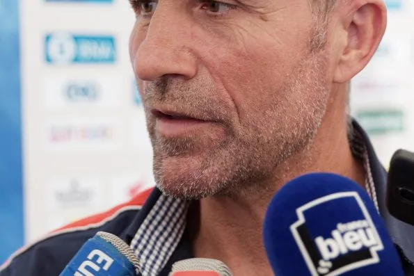 Stéphane Peterhansel being interviewed at the press conference for the 2016 Dakar Rally in November 2015, in his Peugeot Sport years.