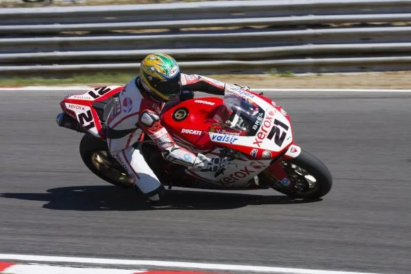 Bayliss cranked over on the red and white number 21 Xerox Ducati 1098 F08 at Druids, Brands Hatch, during the 2008 Superbike World Championship